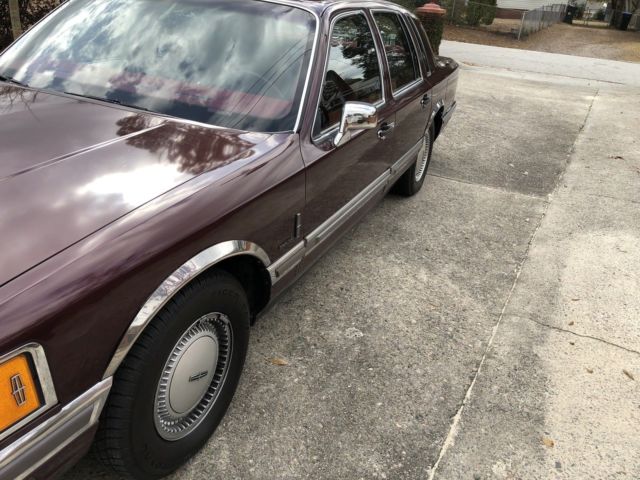 1990 lincoln towncar. motor trend car of the year