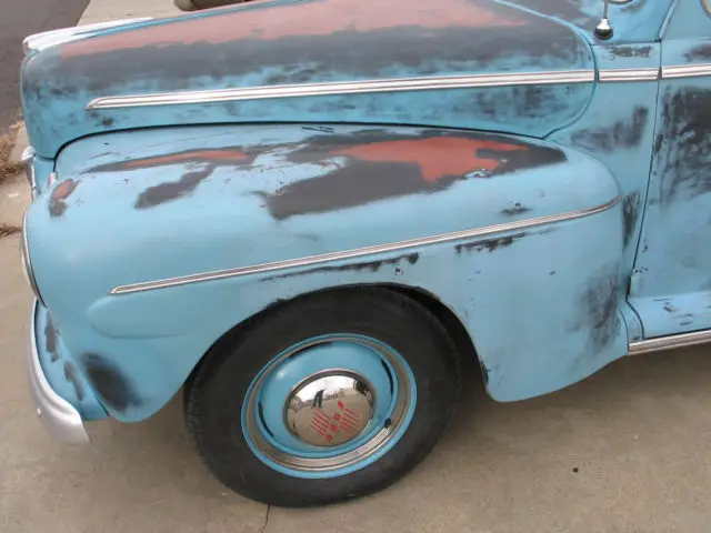 1946 ford super deluxe coupe. rare!! outstanding straight and rust free body!!!