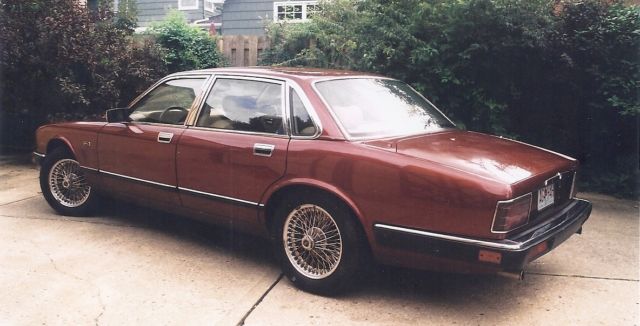 115,000 miles, moroccan red,tan interior, wire wheels, great condition, $6,000