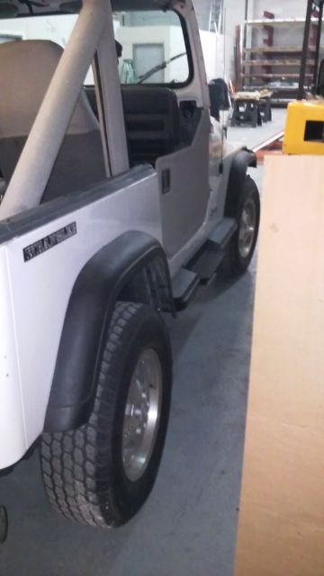 this is a beautiful jeep 6 cy ac solid body runns good and half top and full top