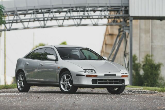 1994 mazda lantis 1.8l 5 speed hatchback rdh 35mpg!