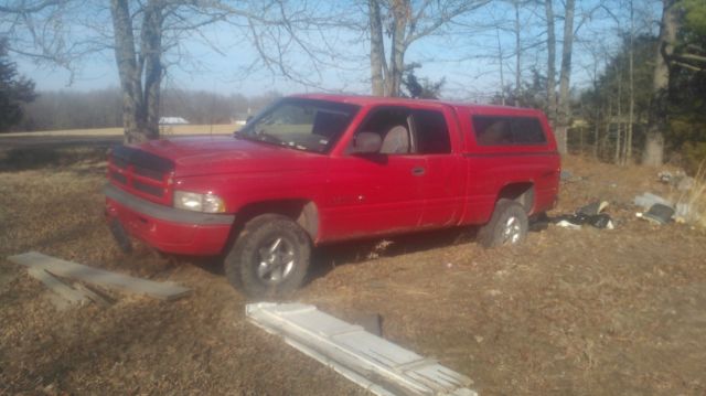 98 ram 4x4 ext. cab 210k strong motor bad transmission sport red