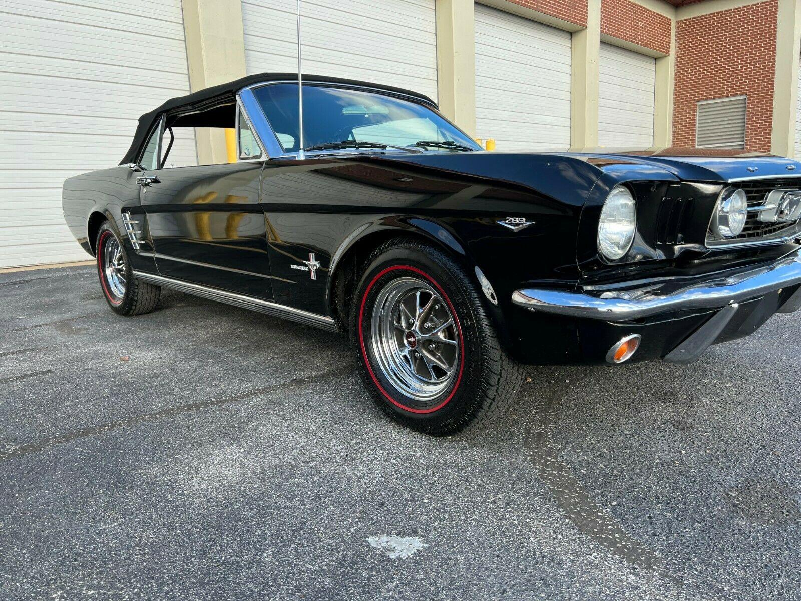 1966 ford mustang convertible raven black with a black pony interior
