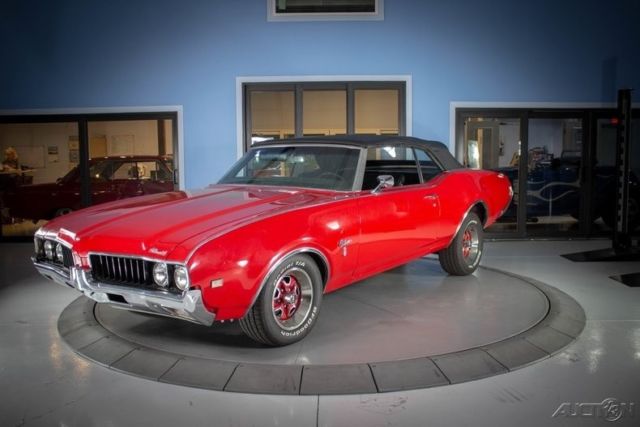 bright red with black top convertible