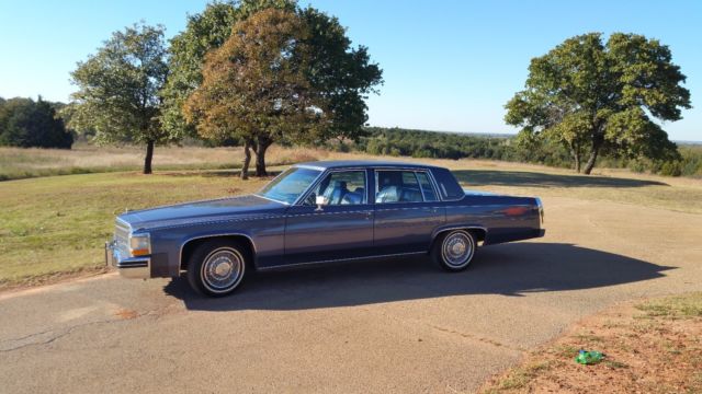 sedan deville- super clean low mileage