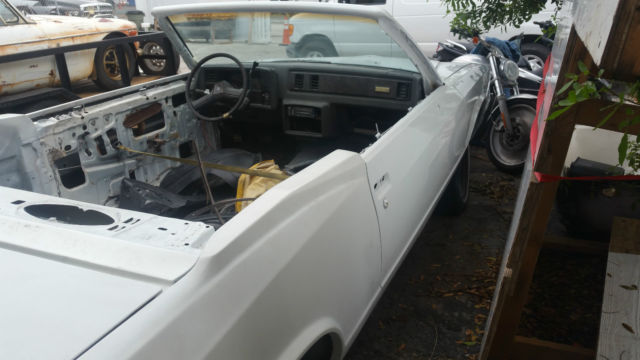 1984 monte carlo rolling frame and body top cut to make convertible fresh paint!