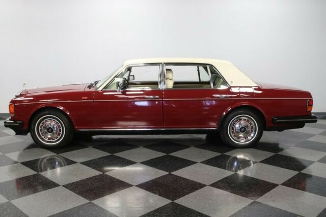classic vintage chrome british luxury burgundy cream leather interior vinyl top