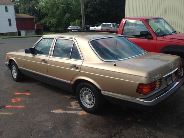 classic 1985 gold mercedes benz 380 se. 4-dr, all pwr, sunroof, 8cyl, leather