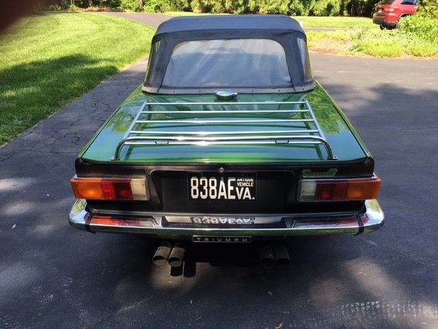 great condition vintage automobile. british racing green with overdrive