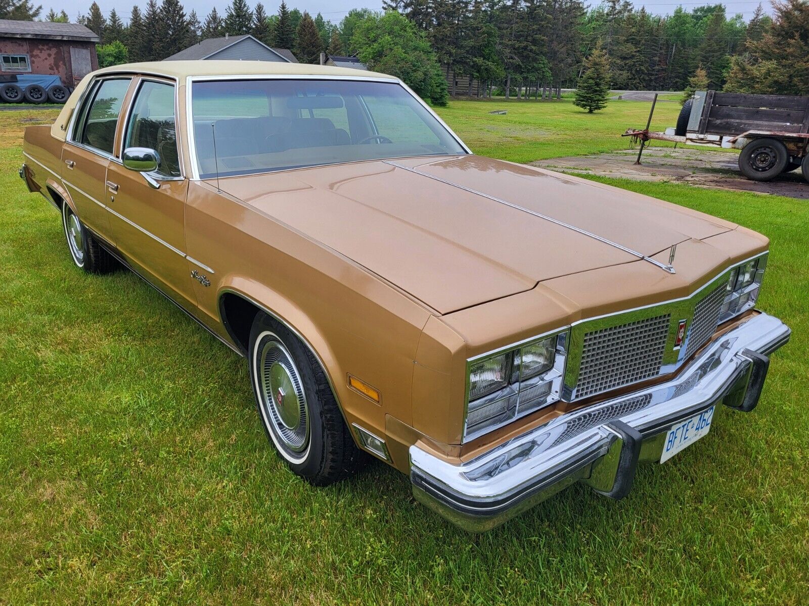 clean, fully working, virtually rust free, indoor stored 1977 olds 99 regency