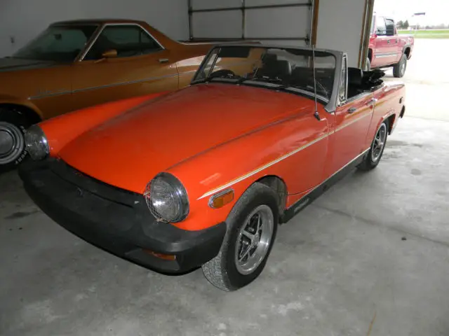 1979 mg midget, 4 speed, great condition, runs and drives, shows 3841 miles