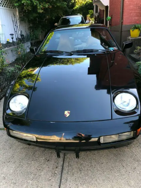 1991 928 gt black with tan interior. ~71k miles. manual transmission