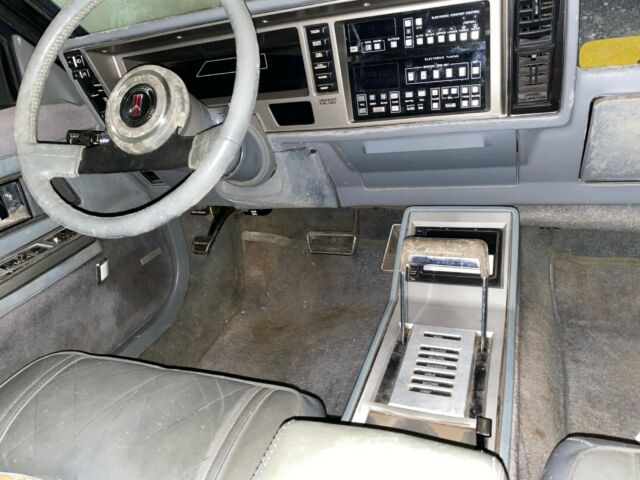 pair of 1986 oldsmobile toronados - 20th anniversary edition