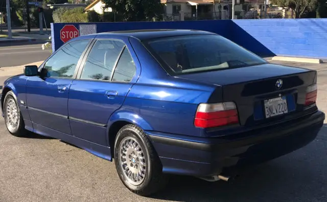 1994 bmw 325i e36 4 door sedan blue metalic freshly painted