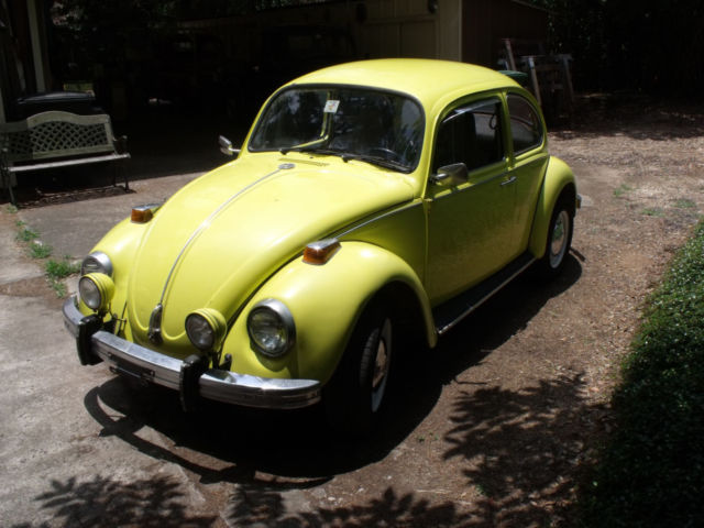 1970 saturn yellow vw beetle