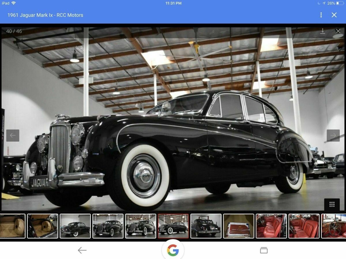 a magnificent 1961 jaguar sports saloon. many tens of thousands of $ spent