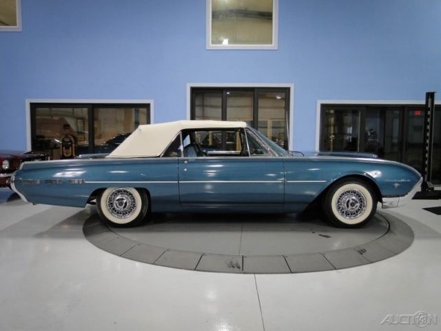 artesian turquoise sports roadster convertible