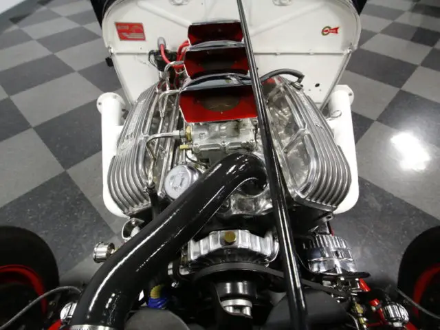 350 v8, 3x2 carb, tremec t5, ford 9" rear, published in hot rod mag, cool ride!