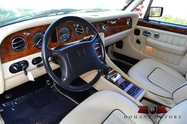 only 20k miles, contrast seat piping, veneered wood trim, well maintained