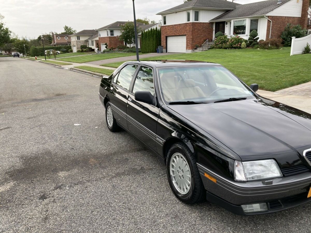 1991 alfa romeo 164 sedan black fwd manual l