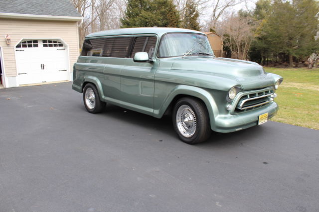 57 chevrolet suburban on a 2006 4x4 z71 tahoe chassis/drivetrain - work of art