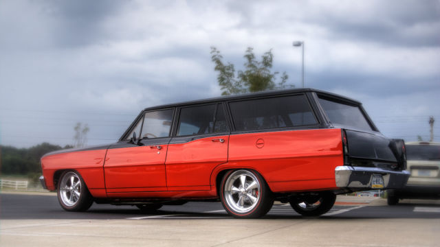 1966 red / black chevy nova station wagon