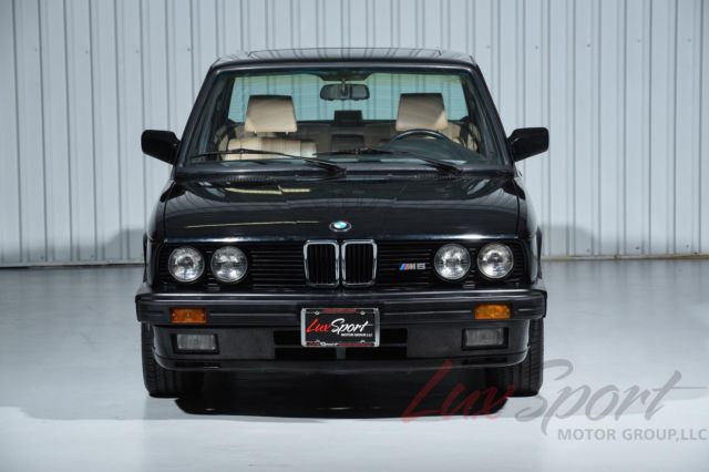 1988 bmw e28 m5 sedan in schwarz black metallic over natural tan leather interio