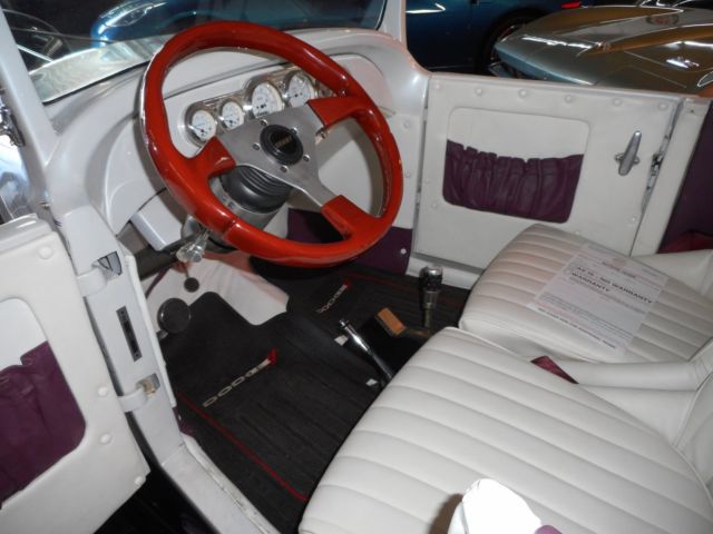 one of a kind dodge turtle deck hot rod with trailor