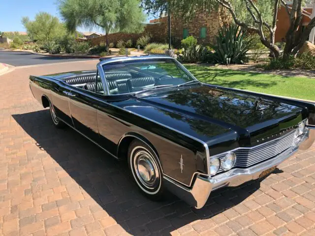 the classic lincoln continental convertible with suicide doors in triple black!