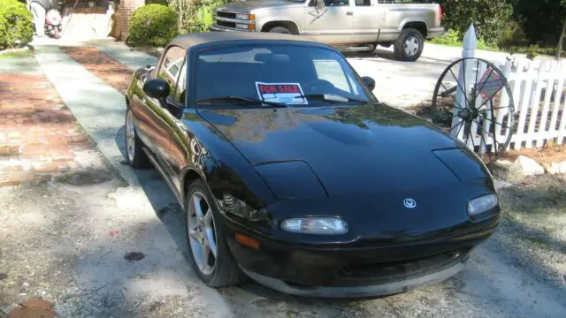 75,000 original miles convertible with all the extras!!!