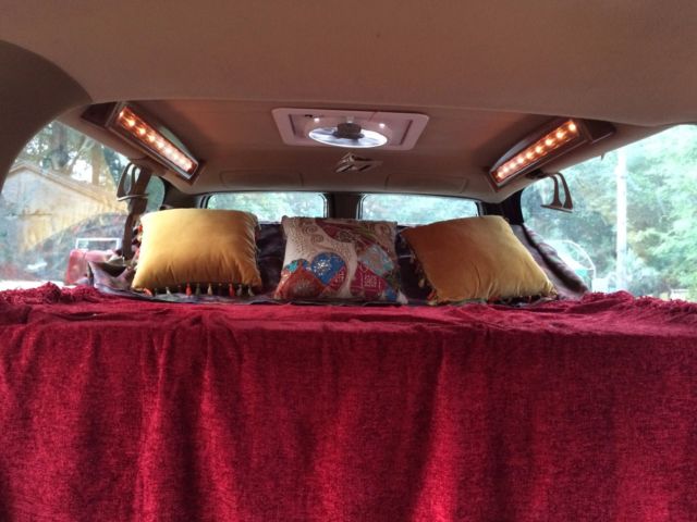 chevy suburban 4 x 4 camper with solar panels