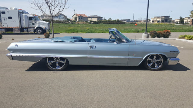 **must see**1963 chevy impala convt frame on restored, 327/4 speed, excellent !!