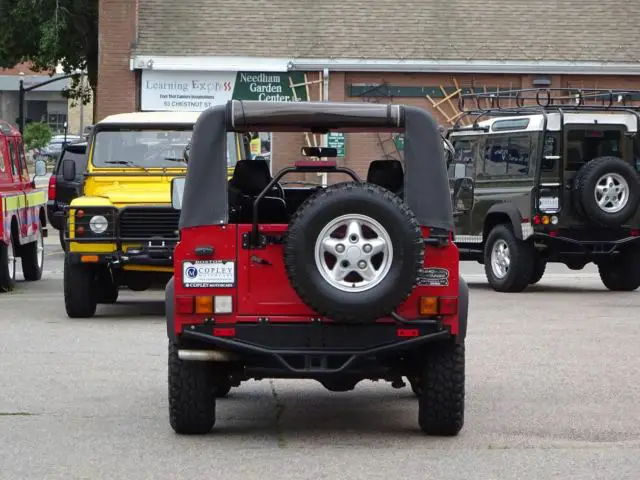 1994 land rover defender 90 portofino red, 5 speed, a/c, only 22k miles