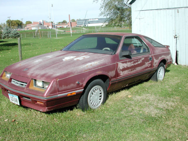 1986 red chrysler laser automatic 4-cyl. 2d hatchback for restore, repair, parts