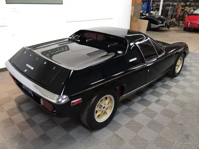 1974 lotus europa twin cam big valve. black with black trim. weber carburetors