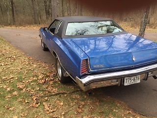 2-door pillared coupe with rear opera windows
