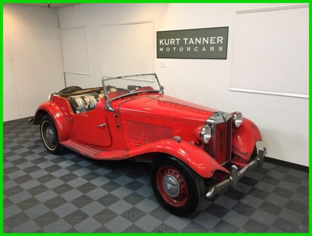 1952 mgtd 1250 roadster. orig yellow w/green trim. 4-speed. original ca car