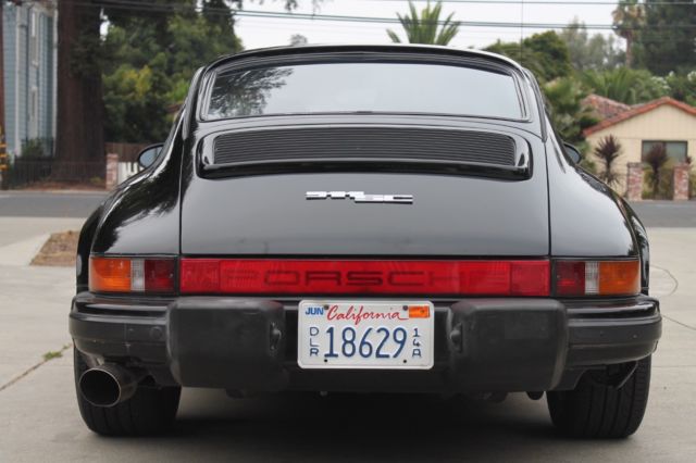 1979 porsche 911 sc, black on black sunroof coupe