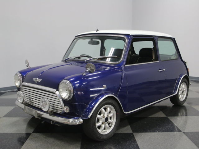 japanese spec mini, fuel injected 1275cc, 4 speed, a/c car, right hand drive!