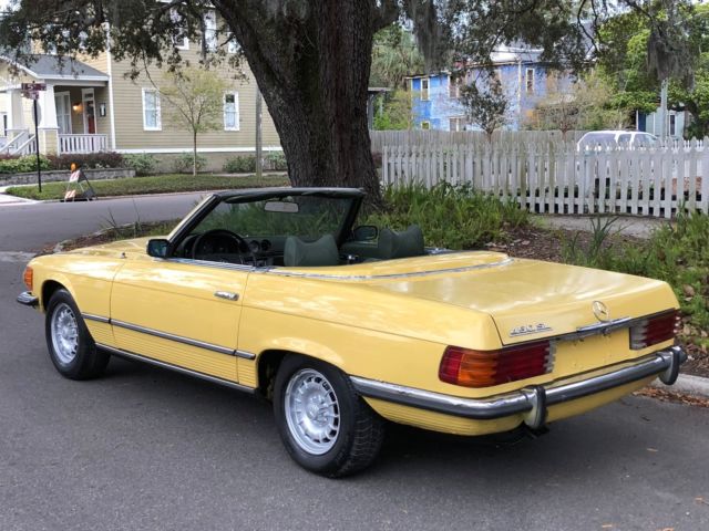 1973 mercedes benz 450sl w107 roadster in rare 624 yellow ext. w. green interior