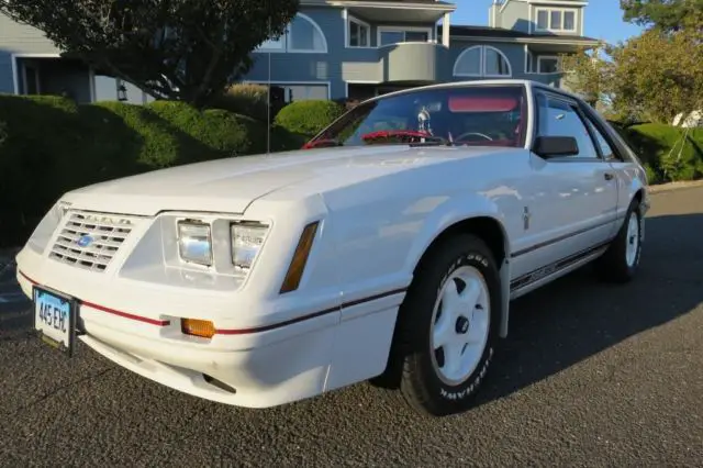 white ford mustang with 57,133 miles available now!