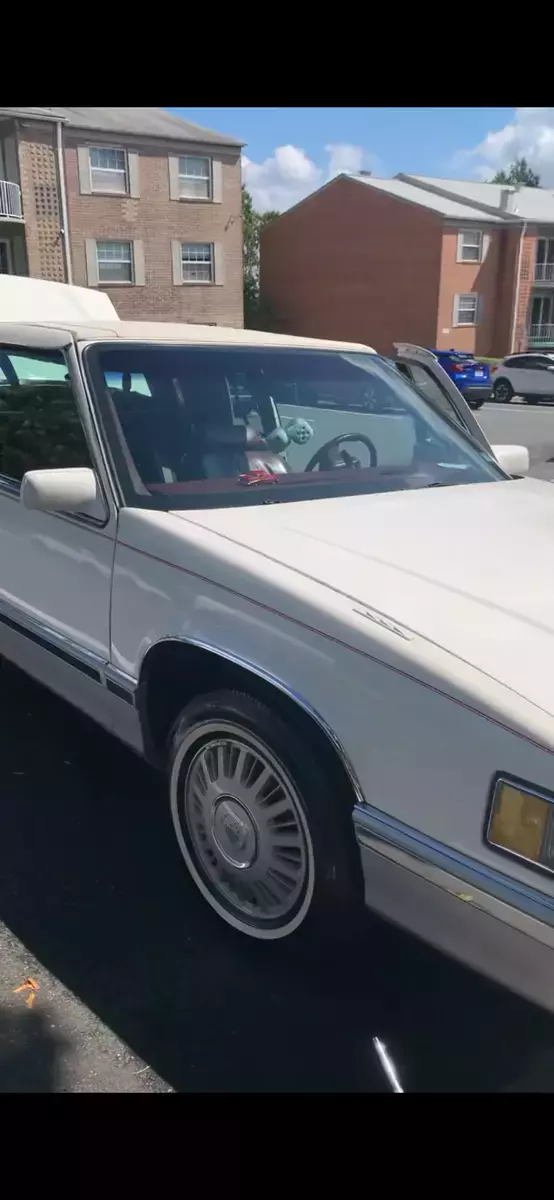 nice white with red leather 4.9 liter v8