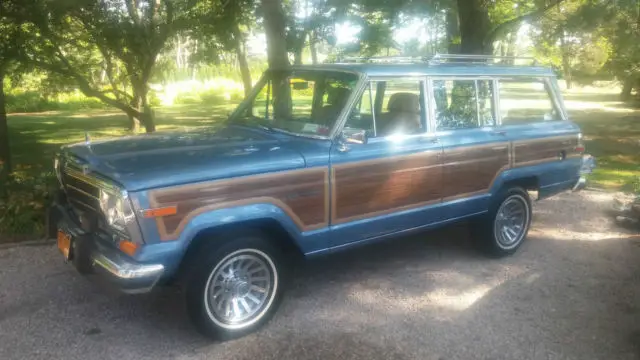 1991 jeep grand wagoneer base sport utility 4-door 5.9l - conservative reserve