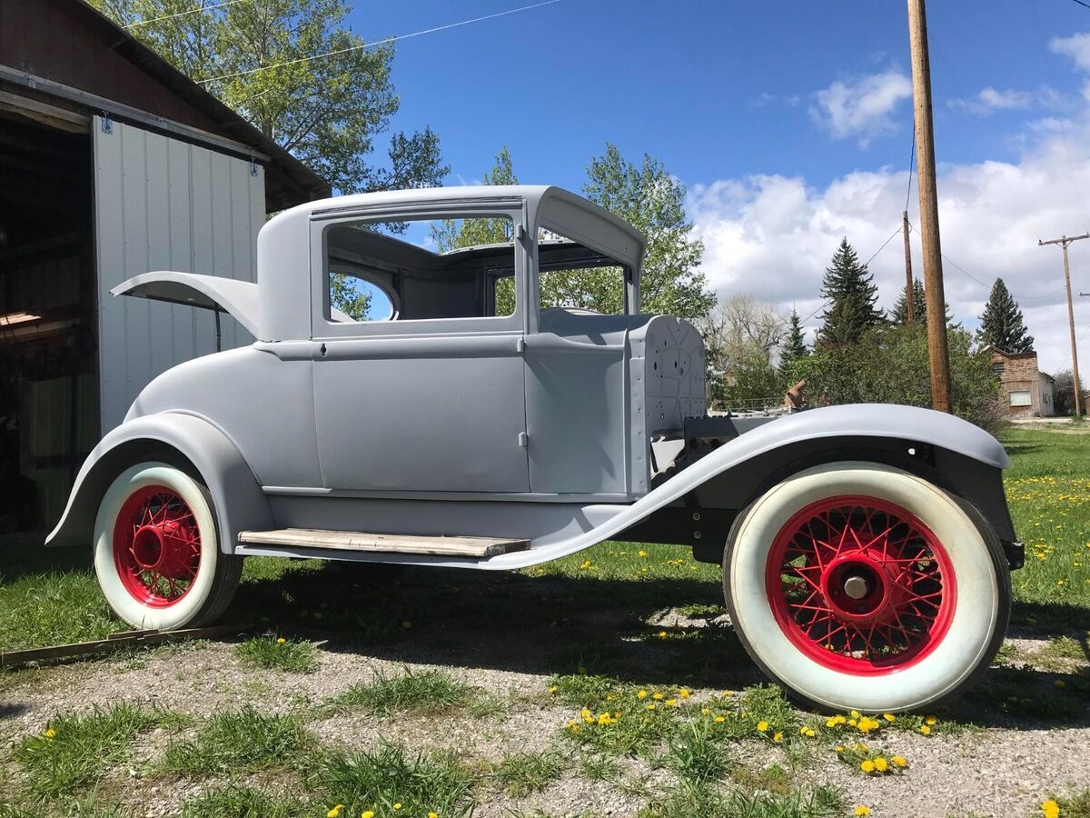 solid body in primer, frame restored and painted