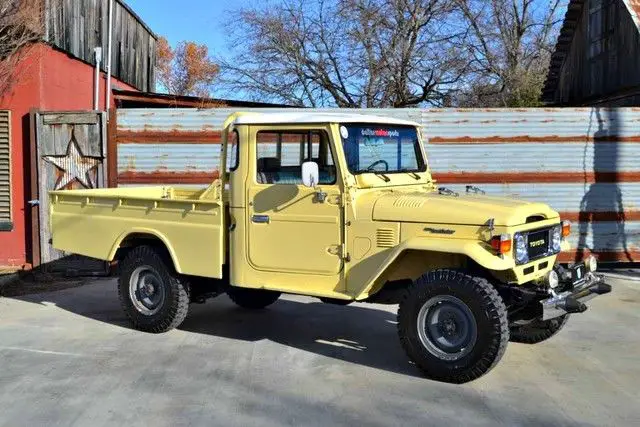 excpetional fj45, bellatrix yellow, restored, vintage air/heat