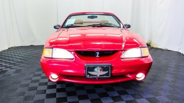 red ford mustang with 4,568 miles available now!