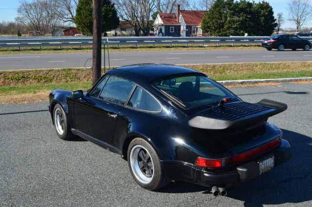 1987 porsche 930 coupe, black on black, low miles, blindingly fast