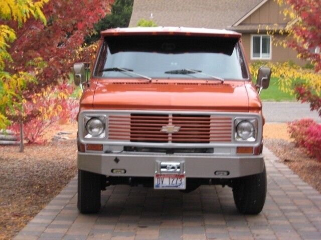 1977chevy van 4x4 10,000miles new everything orange and brown sleeps 4 price obo