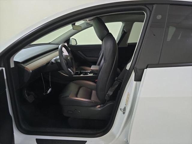 2021 tesla model y standard range rear-wheel drive