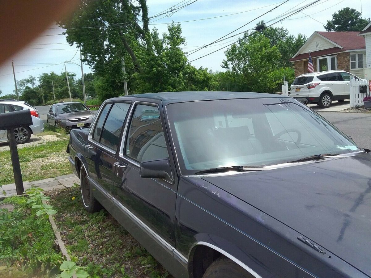 1990 sedan deville, dark blue